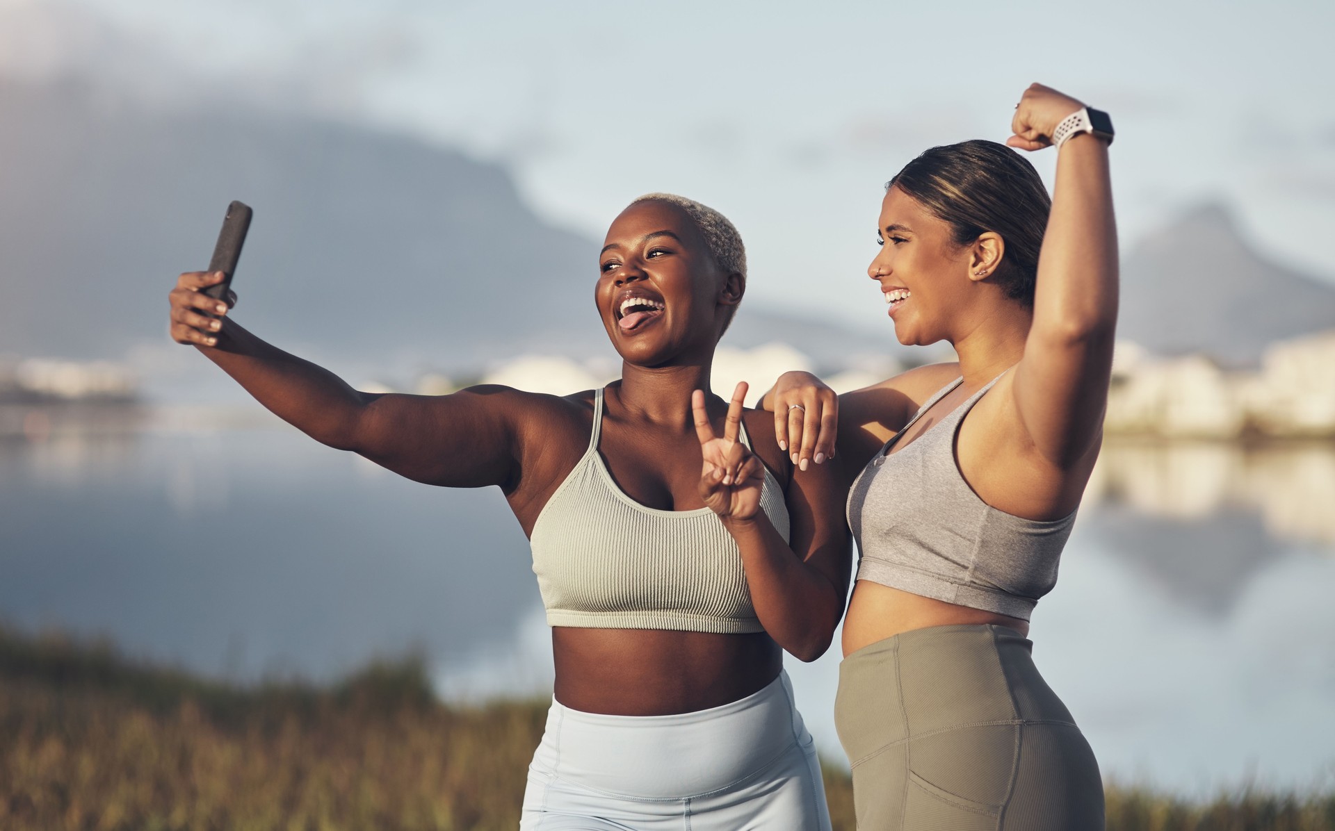 Shot of two women taking a selfie while out for a run
together
